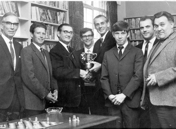 Winwick chess team presentation, 1970: Ted Fox, Brian Clare, Brian Ward, Roger Bruton, Joe Jolley, Terry Allen, David McKendrick, Jack Minshull. Submitted by Brian Clare.
